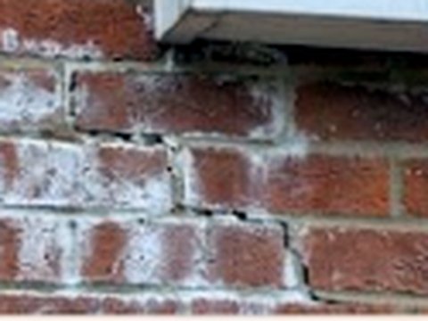 Damage to brickwork from a blocked gutter